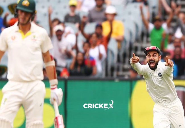 Virat Kohli is delighted as India dismisses Pat Cummins